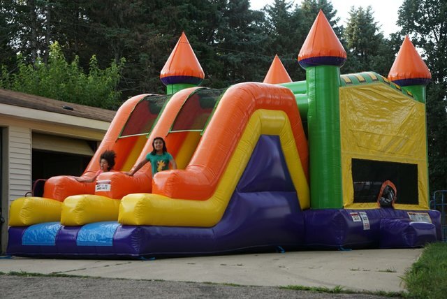 Rent double slide bounce parties in Naperville.